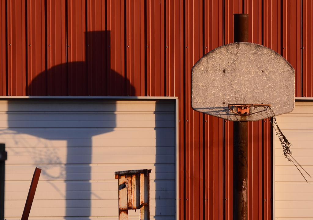 A torn net drifts in the wind